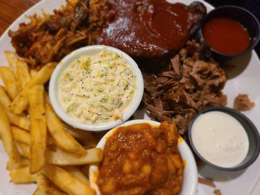 Smokehouse Sampler. Choice of starch. We HAD to get the fries. Maybe onion rings next go. Thumb up.