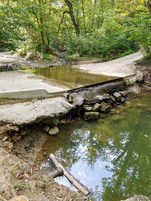 Road closed. Area may still be crossed by neighboring bridge.