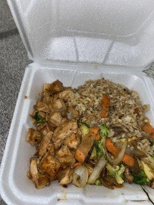 Chicken, rice and vegetables hibachi to go.