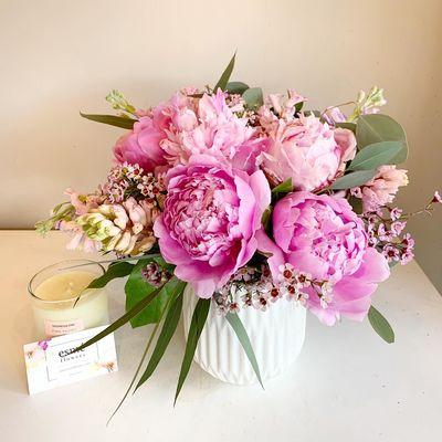 Pretty Pink peonies in a white ribbed ceramic vase