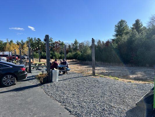 Outdoor seating next to the truck.