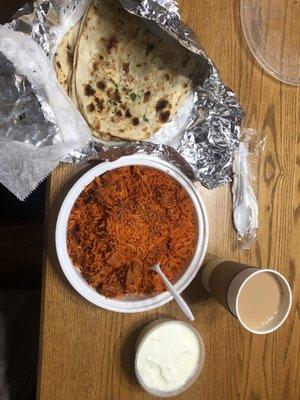 SPICY Chicken Biryani, Garlic Non (two orders), Yogurt (to ease the spice), and Chia Tea