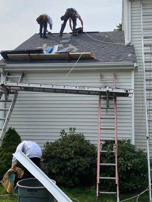 Installing ridge vent. Be sure you are using a high quality ridge vent. Roof ventilation is extremely important.