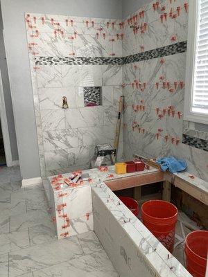 Master bath tub & shower with beginning tile