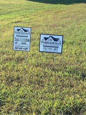 Builder signs on the land out home is being built