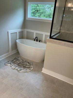 Remodel your bathroom with new curbless shower and free-standing tub. Update your tile with hundreds of options to choose from!