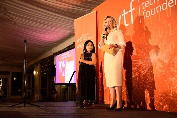 Marie Hale and her daughter Lily speaking at the WTF, Women Tech Founders, awards