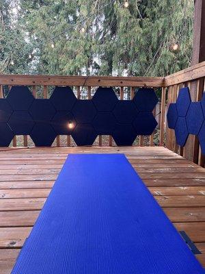 Yoga mat set outside on covered & heated deck