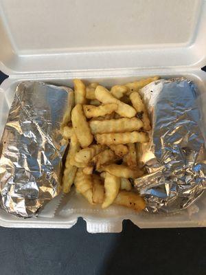 My box with cheesesteak and fries.