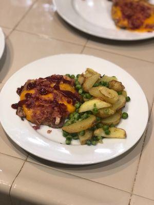 BBQ bacon and cheddar pork chops (I swapped out the chicken) with Yukon potatoes and sweet peas. Wasn't my favorite. Son liked it!