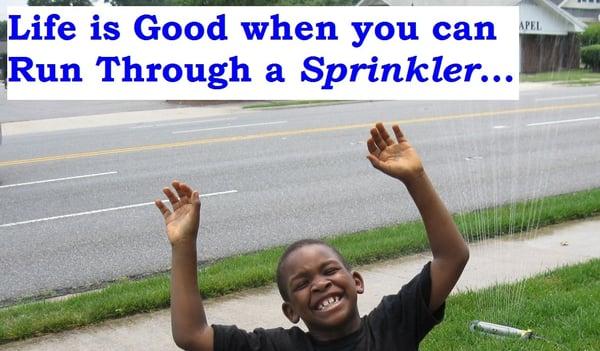 Playing in the sprinkler makes you smile  :)