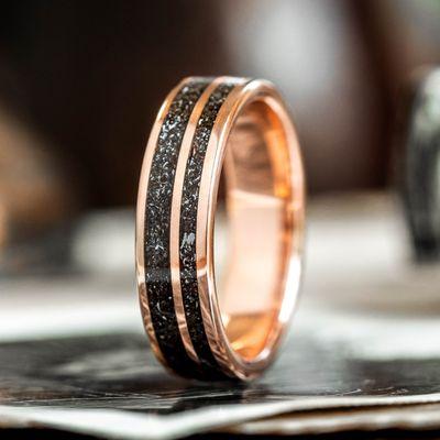 Custom rose gold and meteorite wedding band.