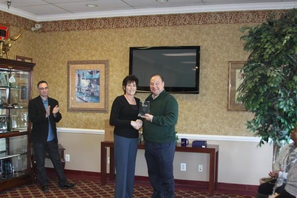 Marcia Stonestreet presented with a Million $ production award for 2014. Pictured (left to right) Steve Nichols, Marcia Stone...