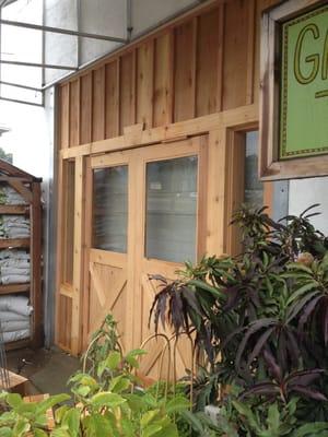 New barn door entrance under construction.