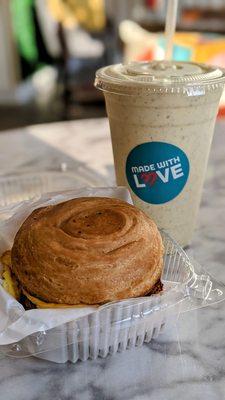 Sausage Egg and Cheese on a croissant bun and Mango Chia Smoothie!