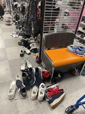 The shoes were just piled up high on every isle