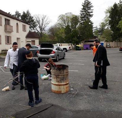 Rabbi Avrohom Notis at chametz burning before Pesach