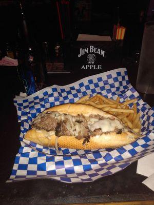 Steak & cheese sandwich  w/ shoestring fries