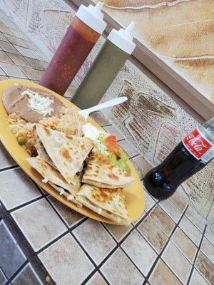 Beef quesadilla with a drink