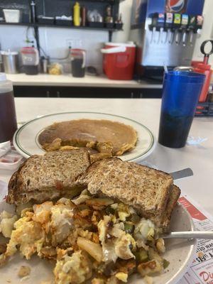 The "Mess" - small size, with wheat toast and one medium pumpkin pancake.