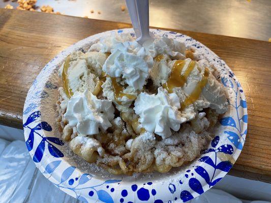 Apple pie funnel cake: fried apples, caramel, cinnamon, whip cream, and ice cream