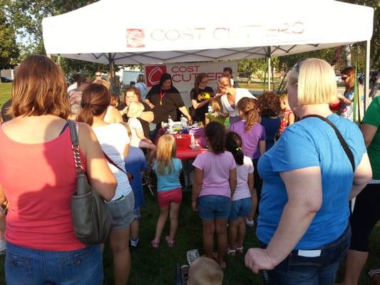 Our licensed stylists love giving back to the Greenfield community at school events and the National Night Out.