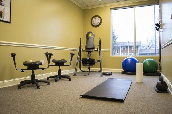 Active therapy room with equipment designed to get you out of pain faster and keep your back in shape.