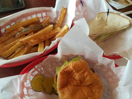 Deluxe cheeseburger, cold turkey sandwich and fries