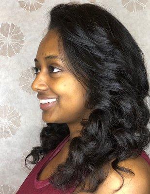 We rarely do blow- out, but when we do, they look like this! And her curls will bounce right back to life! (at Diaspora Salon in Baltimore)