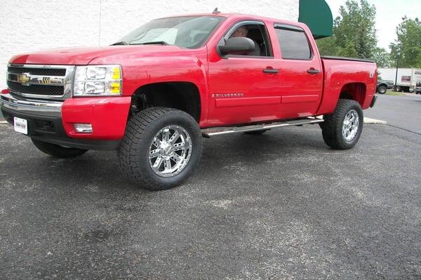 Chevy Silverado Z71 4x4 lift kit, wheels, tires, step guards, bed liner and bug shields