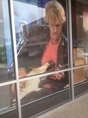 Shreveport homeboy/International Guitar Virtuoso adorns the facade of this store along with Slash & Green Day!