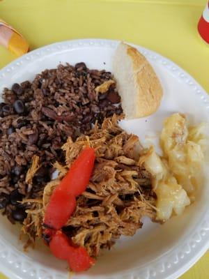 Pulled pork, moros y yuca..you can bring catered food in