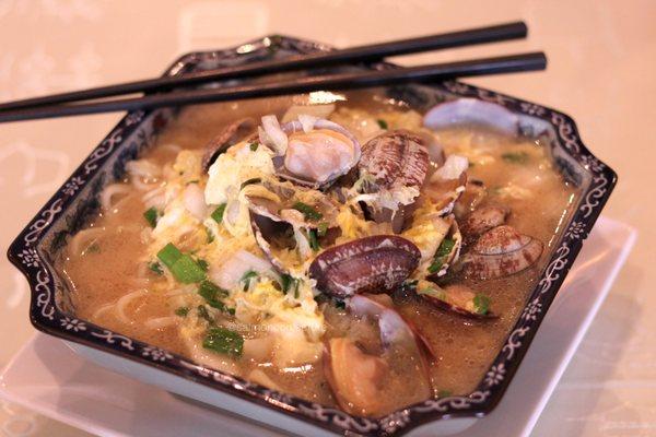 Da lu noodles ($12.95) - yum. Broth is eggy and seafood-y and great. Lots of clams on top.