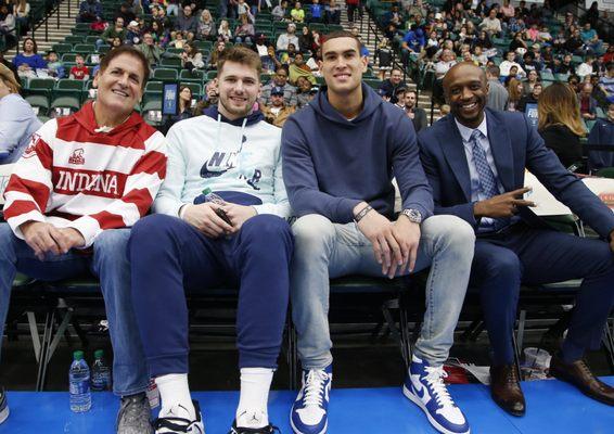 Mark Cuban, Luka Doncic, Dwight Powell, and Jason Terry at a Texas Legends game.