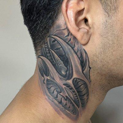 Black and grey Biomech neck piece by Ron Earhart