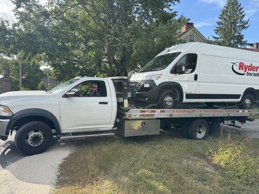 Towing a delivery vehicle