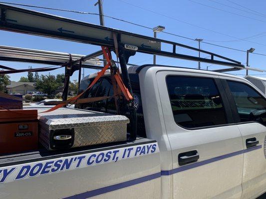 Tinted front, side, and rear windows on Ford F250 pickup truck