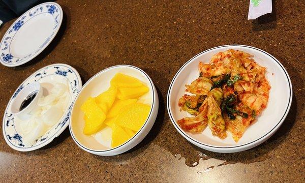 Side dishes! Cabbage kimchi, takuan, sliced onion with black bean sauce