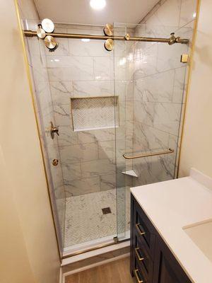 Brass sliding shower doors