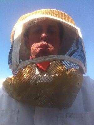 Safety is key in wasp & bee removal. Corey Finley, co-owner & operator of Bug Off Pest Control, in proper protective equipment.