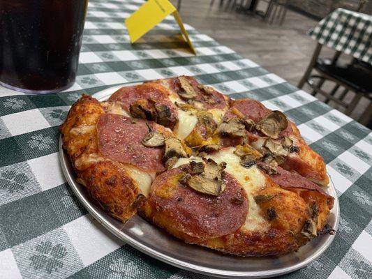 Personal salami and mushroom pizza