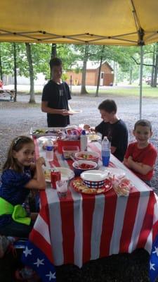 There are picnic tables and porches at many of their lots. Great 4th of July destination for some clean fun and R and R.