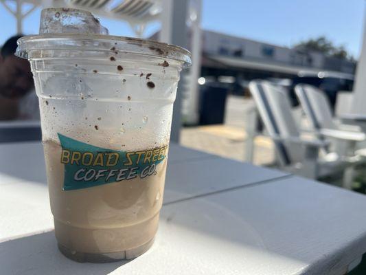 Iced matcha latte on the outdoor patio