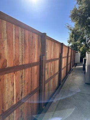 Backside of driveway fence. 8' 4x4 added to 6' when decided later to build fence to 8 feet high. Very sturdy!