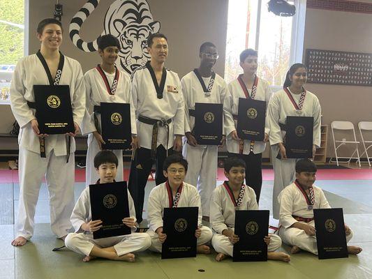 New 2nd, 3rd and 4th Dan black belts with Master Yoo