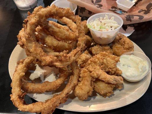 Friend shrimp & onion rings.Their tartar sauce is special! I heated up 2 onion rings in a toaster oven the next day & they were great.