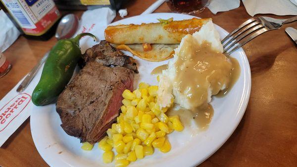 Fresh jalapeno steak, medium corn, mashed potatoes and gravy enchilada.