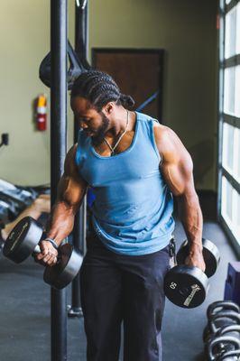 Anthony (trainer) getting a bicep workout in.