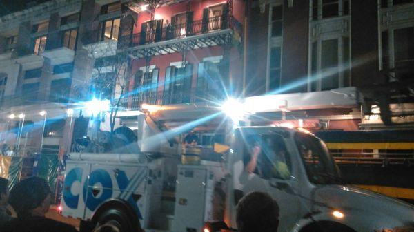 The start of every parade has a Cox truck, an Energy truck and police.