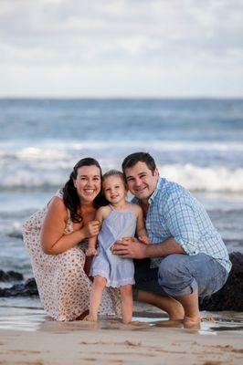 Three people on a beach